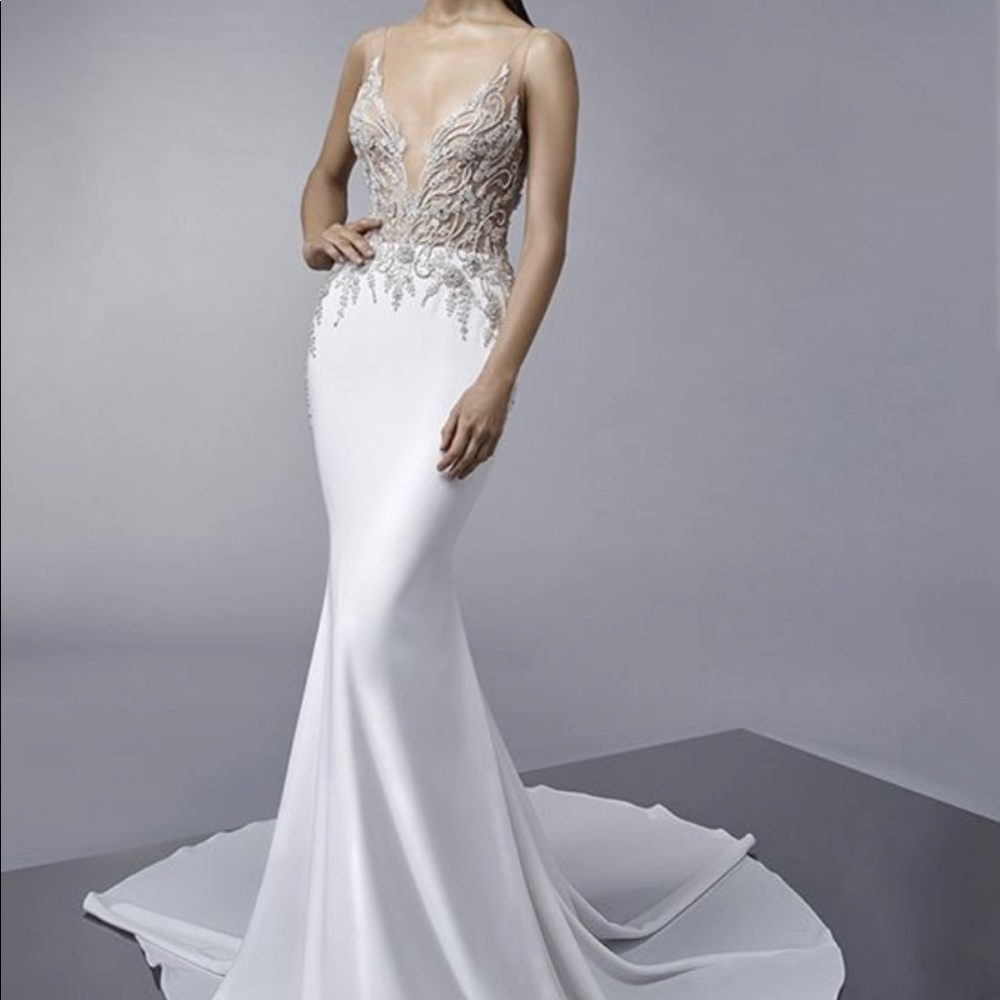 Enzoani - Melinda
Beaded lace bodyice
Ivory/nude - Picture 2 of 3